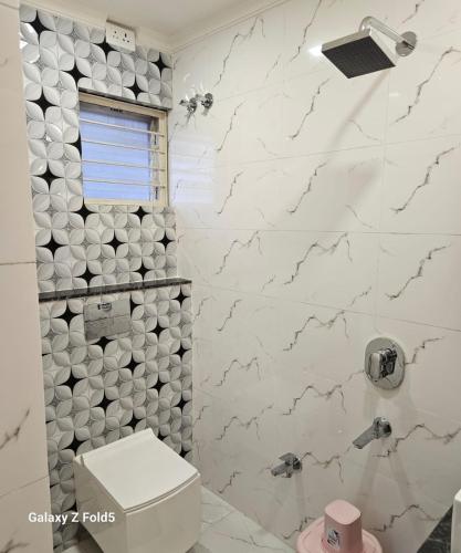 Ein Badezimmer in der Unterkunft Hotel Roxy GKR