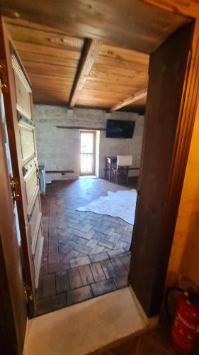 an attic room with a door and a window at Villa Bellavista in Kavarna