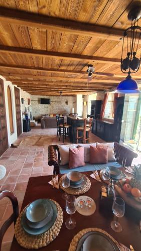 a living room with a couch and a table at Villa Bellavista in Kavarna