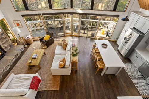 an aerial view of a living room in a house at The Crown A-Frame Gated Central AC Lake Access in Lake Arrowhead