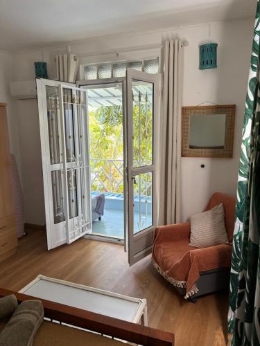 Posezení v ubytování Maison avec jardin à Grand Gaube a 1 min de la plage