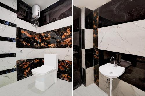 Un baño de HOTEL O RAJ PALACE