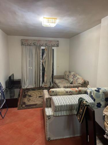 En eller flere senge i et værelse på Golf porto marina north coast