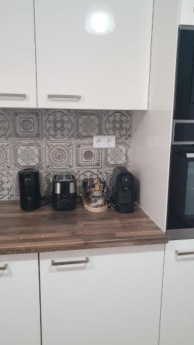 Η κουζίνα ή μικρή κουζίνα στο Apartament central