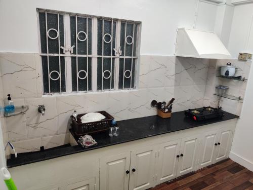 Η κουζίνα ή μικρή κουζίνα στο ZnZ's Apartment