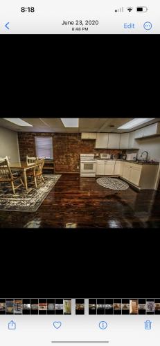 a picture of a living room with a table and chairs at Boone Trace Inn Room 2 in Pineville