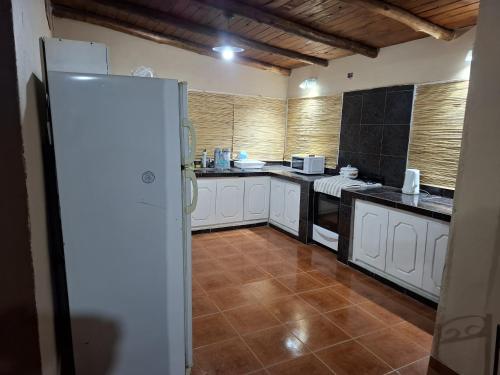 Kuchyň nebo kuchyňský kout v ubytování El Molle City