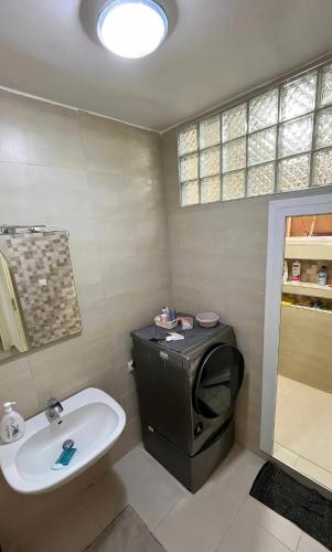 a bathroom with a toilet and a sink and a shower at Spacious F3 in rouiba close to Algiers airport in Alger