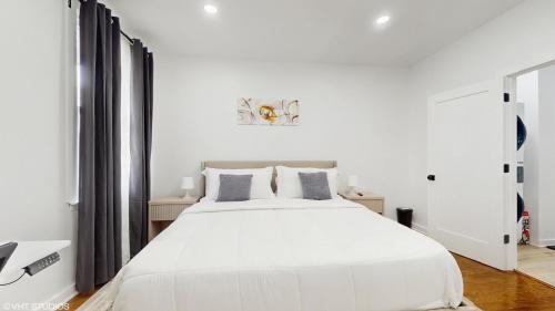 Ένα ή περισσότερα κρεβάτια σε δωμάτιο στο Menod Luxury Apartment