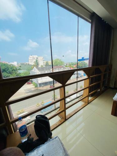 a view of a room with a large window at Taj Mahaal Guest in Colombo