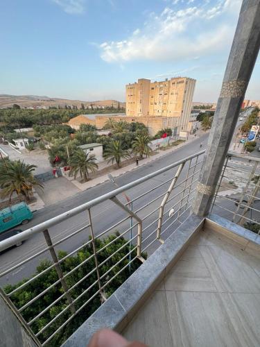a view of a city street from a balcony at Bel appartement en plein Taza in Taza