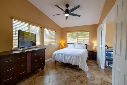 Ένα ή περισσότερα κρεβάτια σε δωμάτιο στο Tropical Retreat GuestHouse