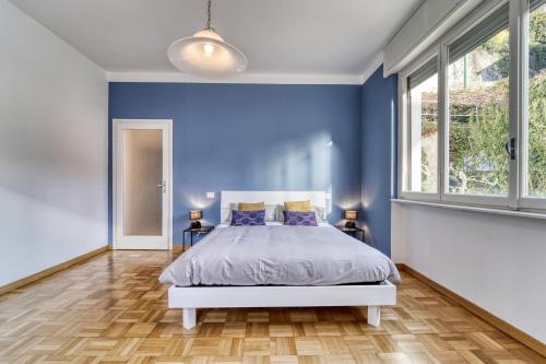 En eller flere senge i et værelse på Casa IDA