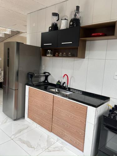 Kuchyň nebo kuchyňský kout v ubytování Pitimbu Beach House