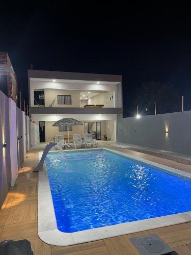 Bazén v ubytování Pitimbu Beach House nebo v jeho okolí