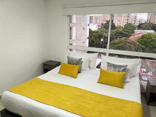 Letto o letti in una camera di Aparta Suites la Flora Flora-Piscina-Jacuzzi