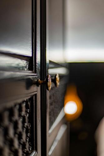 a close up of a door with a knob at Riad Dar Dialkoum in Marrakech