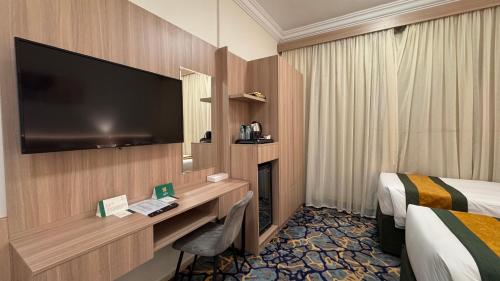 Gambar di galeri bagi فندق نيوليفيل - New Level Hotel di Al Masfalah