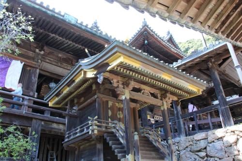 a building with a staircase in front of it at Kamakurayama Farm - B&B Satoyama in Uda