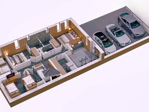 a floor plan of a house with cars at Chalet d'exception 14 pers, proche pistes, parking, wifi - FR-1-267-317 in Le Corbier