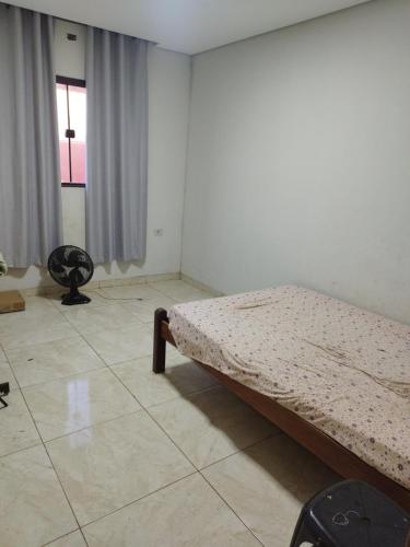 Ένα ή περισσότερα κρεβάτια σε δωμάτιο στο Casa