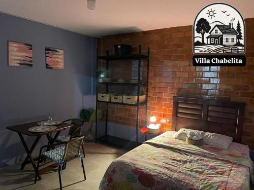Katil atau katil-katil dalam bilik di Villa Chabelita