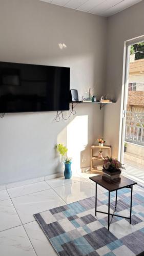 TV a/nebo společenská místnost v ubytování casa completa em condomínio cop30