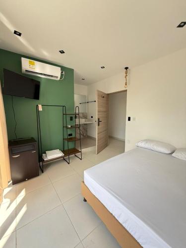 Postel nebo postele na pokoji v ubytování View Theras Hotel