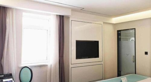 Televisyen dan/atau pusat hiburan di Xana Lite Shenyang Beiling Park Liaoning Building Branch