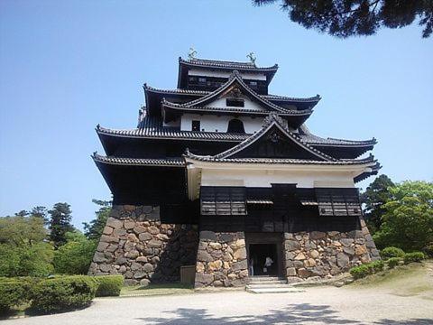 a large building with a tower on top of it at Matsue Plaza Hotel Annex in Matsue