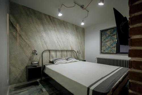 Ένα ή περισσότερα κρεβάτια σε δωμάτιο στο Apartament Duo Style