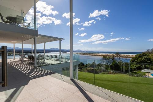 an empty house with a view of the ocean at No1 Sangaree in Plettenberg Bay