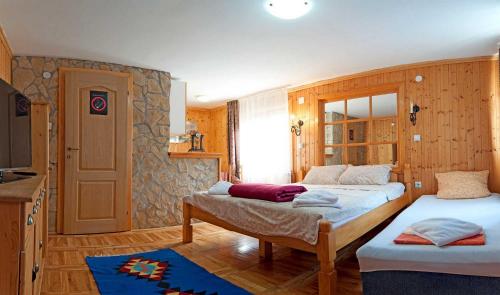 Postel nebo postele na pokoji v ubytování Vila Boska Palic