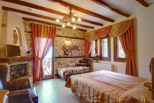 Postel nebo postele na pokoji v ubytování Nikolaou House
