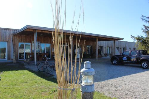 a fire hydrant in front of a building at Halbinsel Resort Peenemünde in Peenemünde