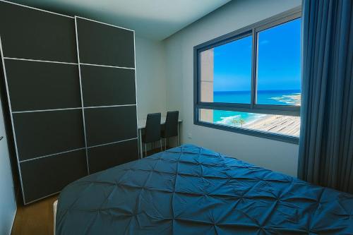 Postel nebo postele na pokoji v ubytování Luxurious Beach apartments