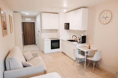 Kuchyň nebo kuchyňský kout v ubytování Rezydencja Ogród Saski Lublin