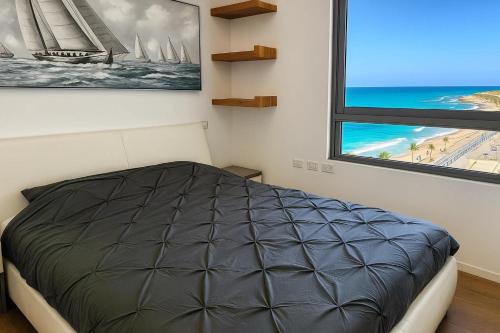 Postel nebo postele na pokoji v ubytování Luxurious Beach apartments
