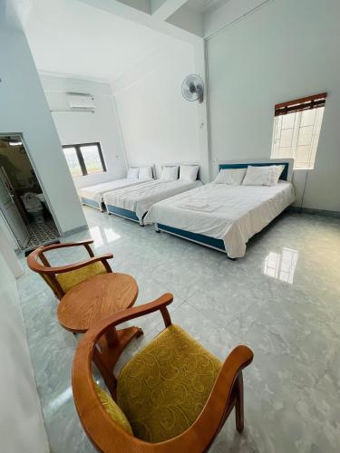Ένα ή περισσότερα κρεβάτια σε δωμάτιο στο 26 Hotel Mộc Châu