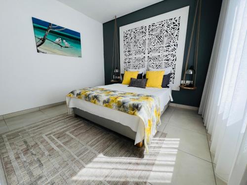 Ένα ή περισσότερα κρεβάτια σε δωμάτιο στο Appt super luxe 3 chambres Pointe aux Canonniers