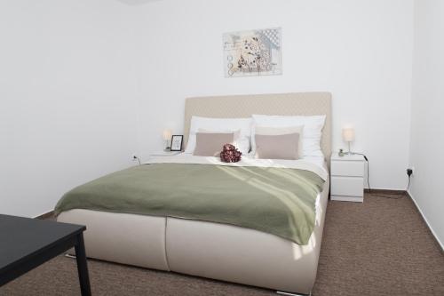 Ένα ή περισσότερα κρεβάτια σε δωμάτιο στο Valnovka Wellness Hotel