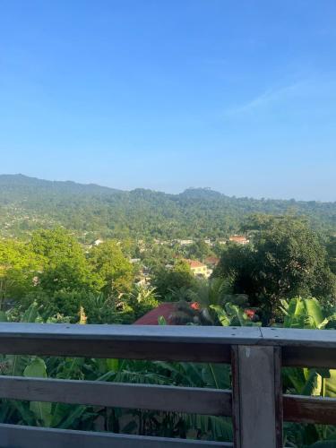 a view of the city from the balcony of a house at Casa Augusto Stunning view in Trindade