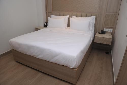 Postel nebo postele na pokoji v ubytování Saarya - A Boutique Hotel