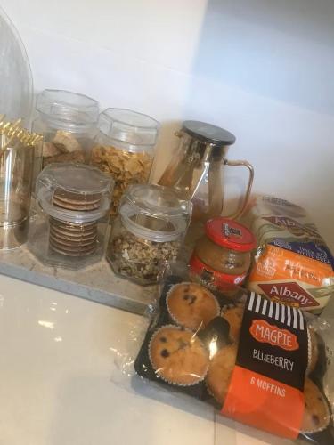 a group of food items sitting on top of a refrigerator at African Diamond - Date Night Suite in Benoni