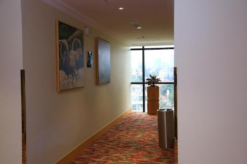 a hallway with a large window in a building at Ramada Addis, Addis Ababa in Addis Ababa