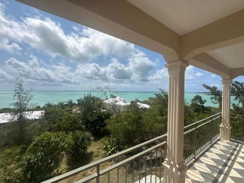 a balcony with a view of the ocean at Le Refuge in Rodrigues Island