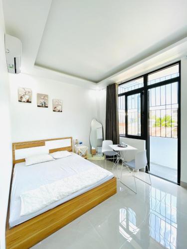 Katil atau katil-katil dalam bilik di Vũ Trâm Homestay
