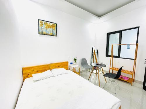 Katil atau katil-katil dalam bilik di Vũ Trâm Homestay