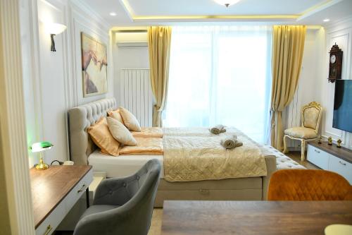 Una cama o camas en una habitación de Residence LUX