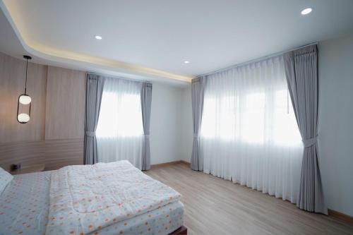 Katil atau katil-katil dalam bilik di Be House 5 SongKhla